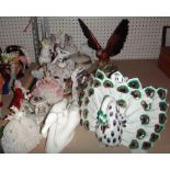 A varied collection of ceramics, including Crown Staffordshire parrots, Lladro figures,