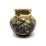 A Moorcroft 'Hartgring' vase by Emma Bossons, circa 2002, 15cm high, boxed.