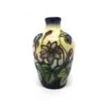 A small Moorcroft 'Hepatica' cream ground vase, circa 1995, 10cm high, boxed.