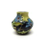 A small Moorcroft 'Cornflower' vase, circa 1995, 8.5cm high, boxed.