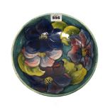 A Moorcroft 'Anemone' bowl, circa 1950, blue/green ground, paper label, 21cm diameter.