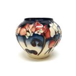 A Moorcroft 'Sweet Pea' vase, 2001, 11cm high, boxed.