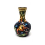 A small Moorcroft 'Celtic Web' vase by Emma Bossons, circa 2002, blue ground, 10cm high, boxed.