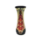 A Moorcroft 'Foxglove' vase, circa 2000, 31cm high, boxed.