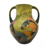 A Moorcroft two handled 'Carp' vase, 1994, green ground, 33cm high, boxed.