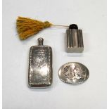 A silver scent bottle, of curved rectangular flask form, having decorated borders, Birmingham 1913,