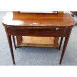 A George III inlaid mahogany card table on tapering square supports, 92cm wide.