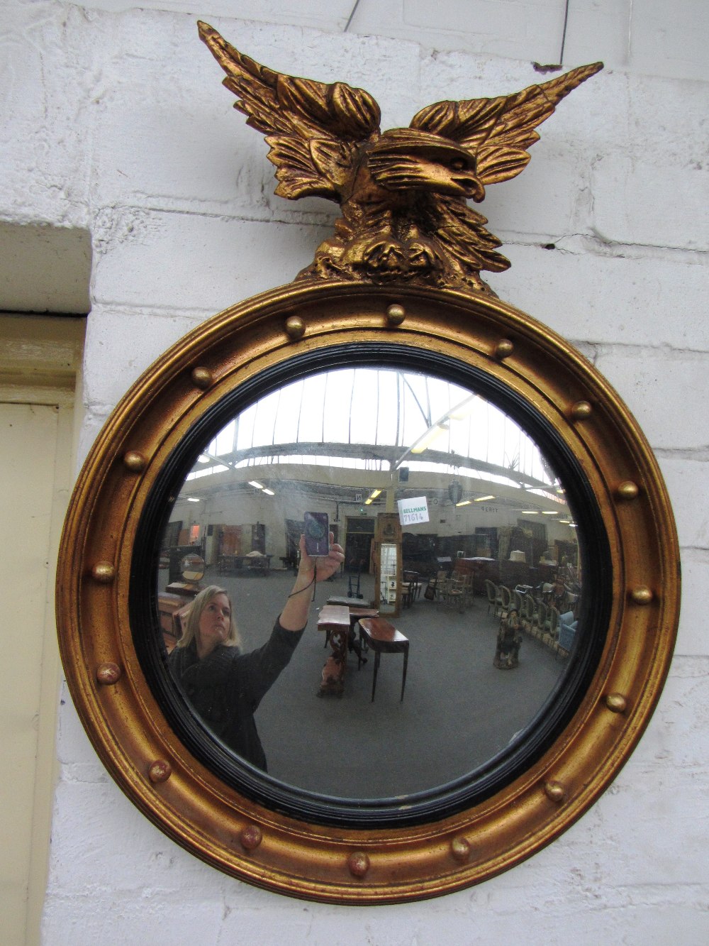 A small early 20th century oval gilt framed mirror with acanthus scroll decoration, - Image 2 of 2