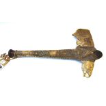 A Gran Chaco horse jawbone axe from Patagonia, South America, early 20th century, bound with sinew,