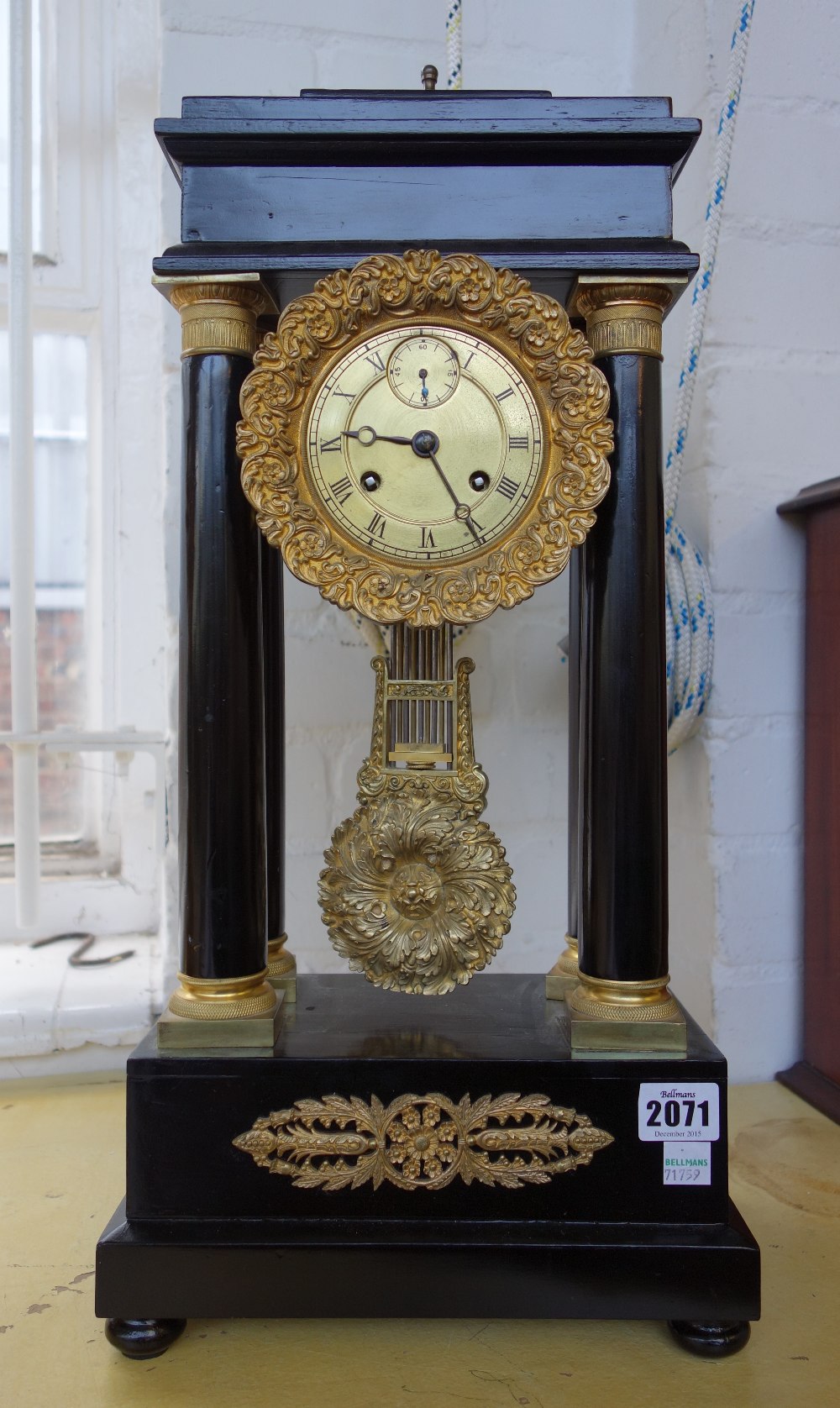 A French Empire ormolu mounted ebonised portico mantel clock, - Image 2 of 2