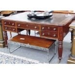 A William IV mahogany writing desk with five frieze drawers and matching opposing,