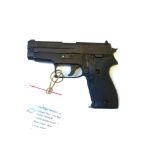 A 9mm German Sig Sauer P225 semi-automatic pistol, serial number M400538, deactivated 12/10/2015,