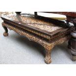 A 20th century Thai rectangular hardwood coffee table with carved decoration,