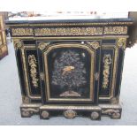 A 19th century gilt metal mounted brass inlaid hard stone applied slate top breakfront single door