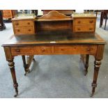 A 19th century Aesthetic Movement figured walnut gilt heightened writing table,