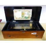 A Swiss walnut cased music box, late 19th century,