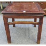 A late 19th century Chinese hardwood corner leg table with solid square top and supports united by