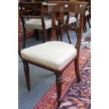 A set of four early Victorian mahogany framed dining chairs,