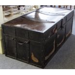 A large early 20th century rectangular metal trunk with side handles, 120cm wide.