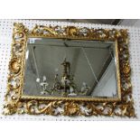 A late 19th century gilt framed Florentine wall mirror with pierced acanthus frame,