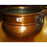 A 19th century twin handled copper cauldron.