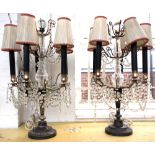 A pair of silvered metal and glass mounted five branch table lamp candelabra,