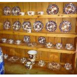 A group of Crown Derby Imari pattern ceramics, including a tea set and a twin handled urn.