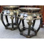 A pair of early 20th century black lacquer chinoiserie decorated garden seats of open barrel form,