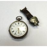 A lady's base metal cased novelty fob watch, formed as a cow bell,