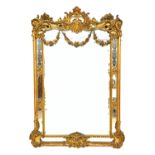 A large late 19th century gilt framed overmantel mirror,