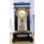 A French Empire ormolu mounted ebonised portico mantel clock,