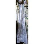 One pair of cream and grey curtains with a classical figural design, 106cm wide x 147cm long.