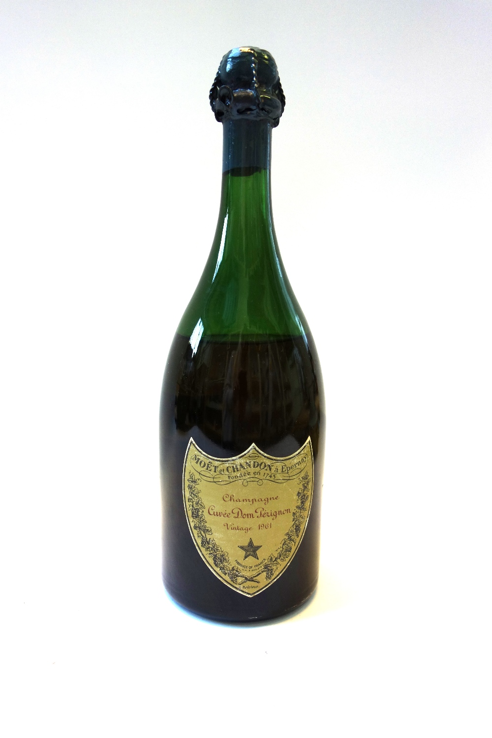 One bottle of Dom Perignon 1961 vintage champagne (level at shoulders).
