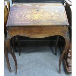 An early 20th century gilt metal mounted marquetry inlaid rosewood bureau de dame,