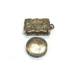 A Victorian silver shaped rectangular vinaigrette, with a scroll pierced and gilt grille,