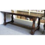 A 17th century style oak plank top refectory table,