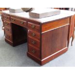 A late 19th century mahogany pedestal desk with nine drawers about the knee, on plinth base,