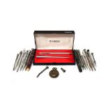 A Parker steel cased fountain pen and a matching fibre pen, with a case,