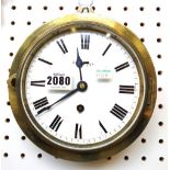 A brass cased dial clock, late 19th century, with white enamel dial and single train movement,