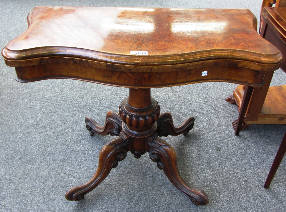 A Victorian figured walnut card table,