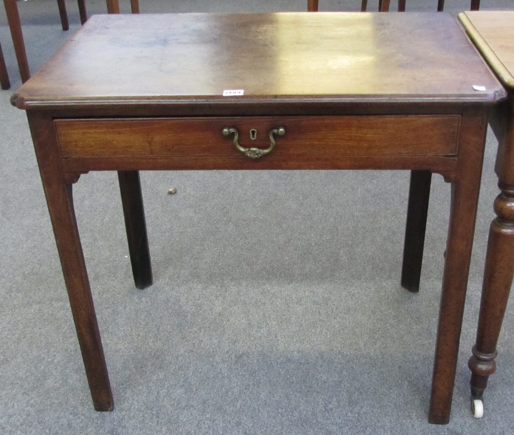 A mid 18th century mahogany side table with single frieze drawer, on canted square supports,
