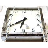 A modern Art Deco style wall clock with chromed stepped frame and white dial, detailed 'Newgate,
