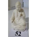 A Chinese 'blanc de chine' figure of a B