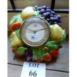 A Deco ceramic fruit motif clock with im