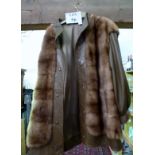 A German mink fur and leather coat est: