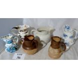 Two Doulton Harvestware jugs and four ot