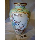 An oriental cloisonné vase with bird dec