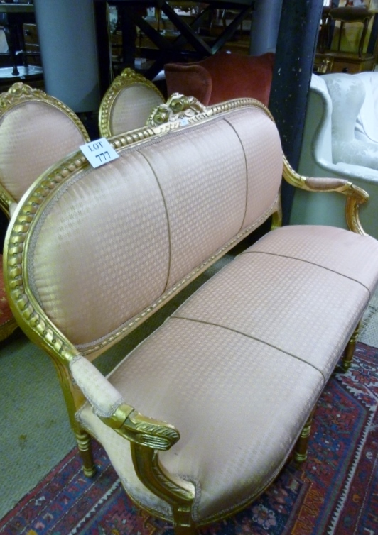 A French three piece suite decorated in