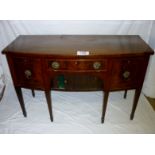 A Georgian mahogany bow front sideboard