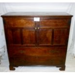 A fine 18c oak press cupboard with two p